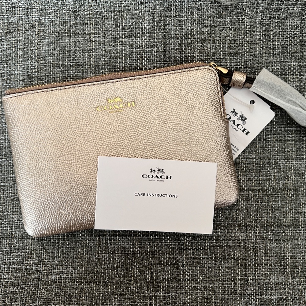 NWT Rose Gold Coach Wristlet